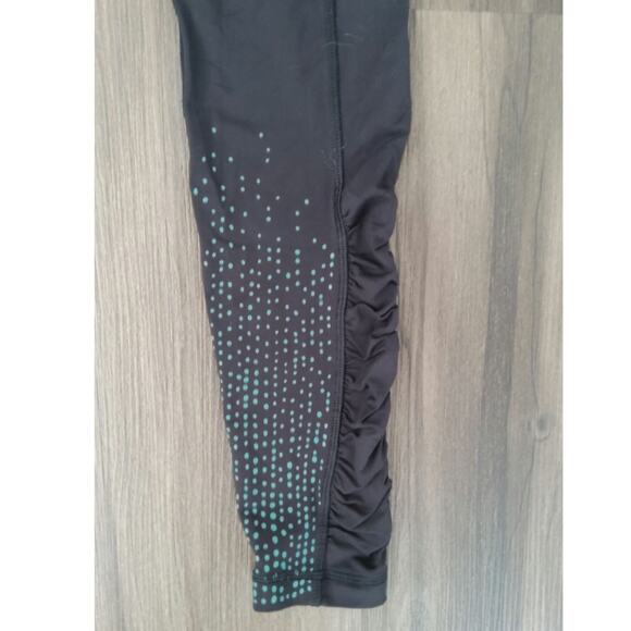 Lululemon leggings speed up lights out black teal eyelet lzip pocket side size 4 - Picture 6 of 6